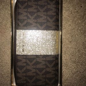 Michael Kors Brown Wallet with a Center Stripe
